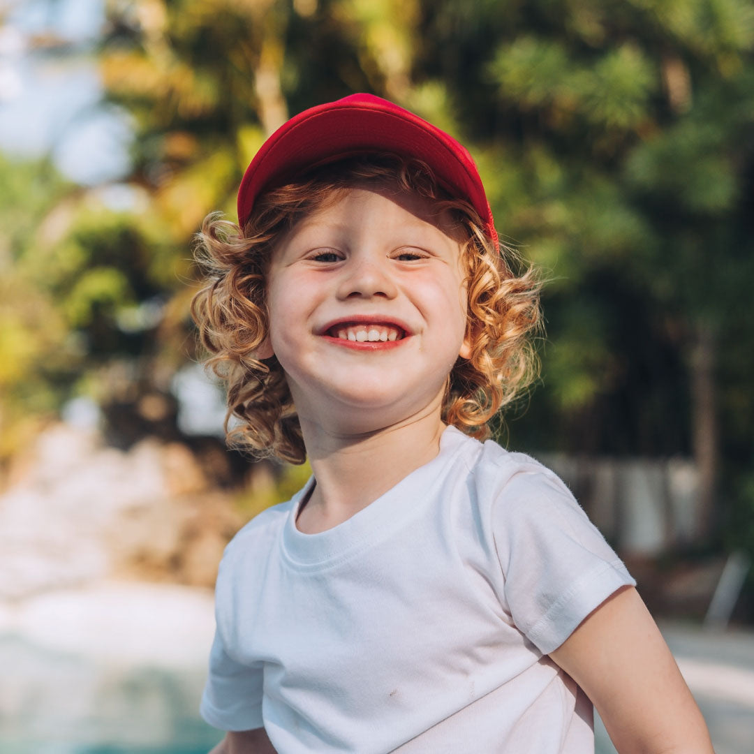 Youth Uflex Curved Peak Trucker Cap