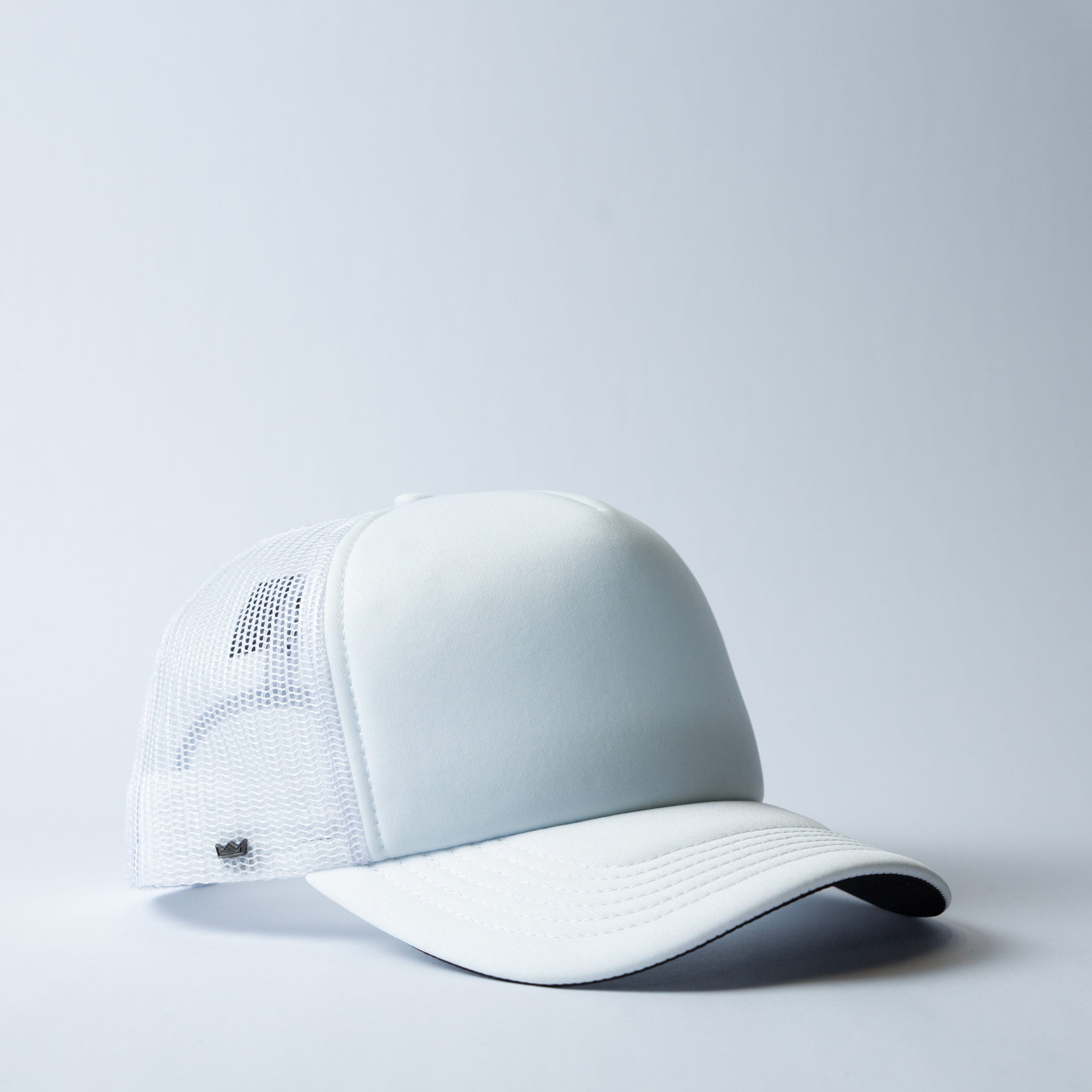 The 5 Panel Curved Peak Trucker