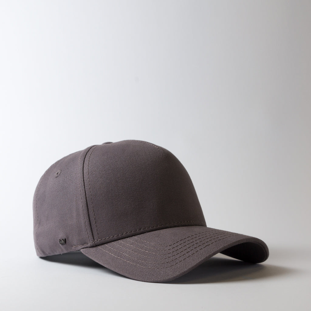 The 5 Panel Curved Peak Snapback